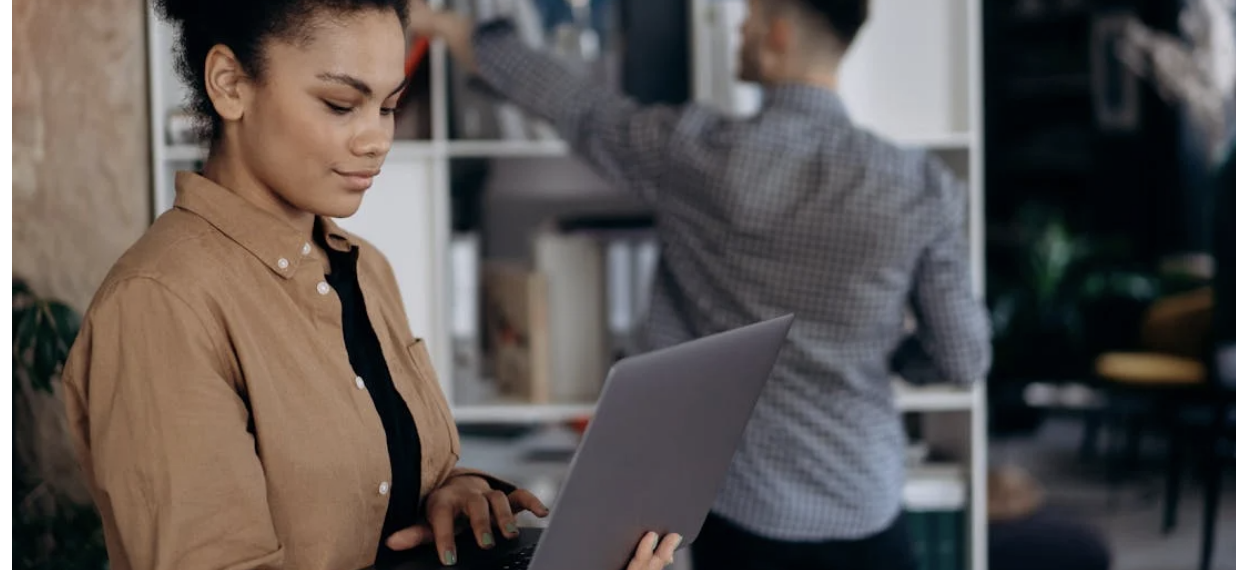 A Woman Using Laptop Computer
